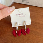 EF2 Bow Tie Pearl C-shaped Earrings