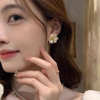 32#Beige aurora camellia stud earrings