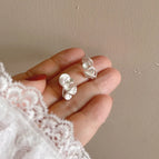 19 # Silver Irregular Mosquito Coil Ear Clip