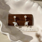 Pearl fishtail earrings