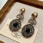 2511068 Vintage Distressed Black Round Earrings