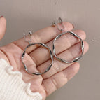 104-- Silver Twisted Coil Mosquito Coil Clip-on Earrings