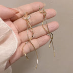 68-Golden Twisted Tassel Mosquito Coil Ear Clip