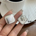 4525--Silver Imitation Leather Square Ear Clip Style